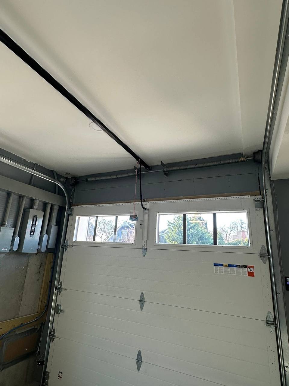 Garage door spring repair in Hamilton Ontario by AS Locksmith